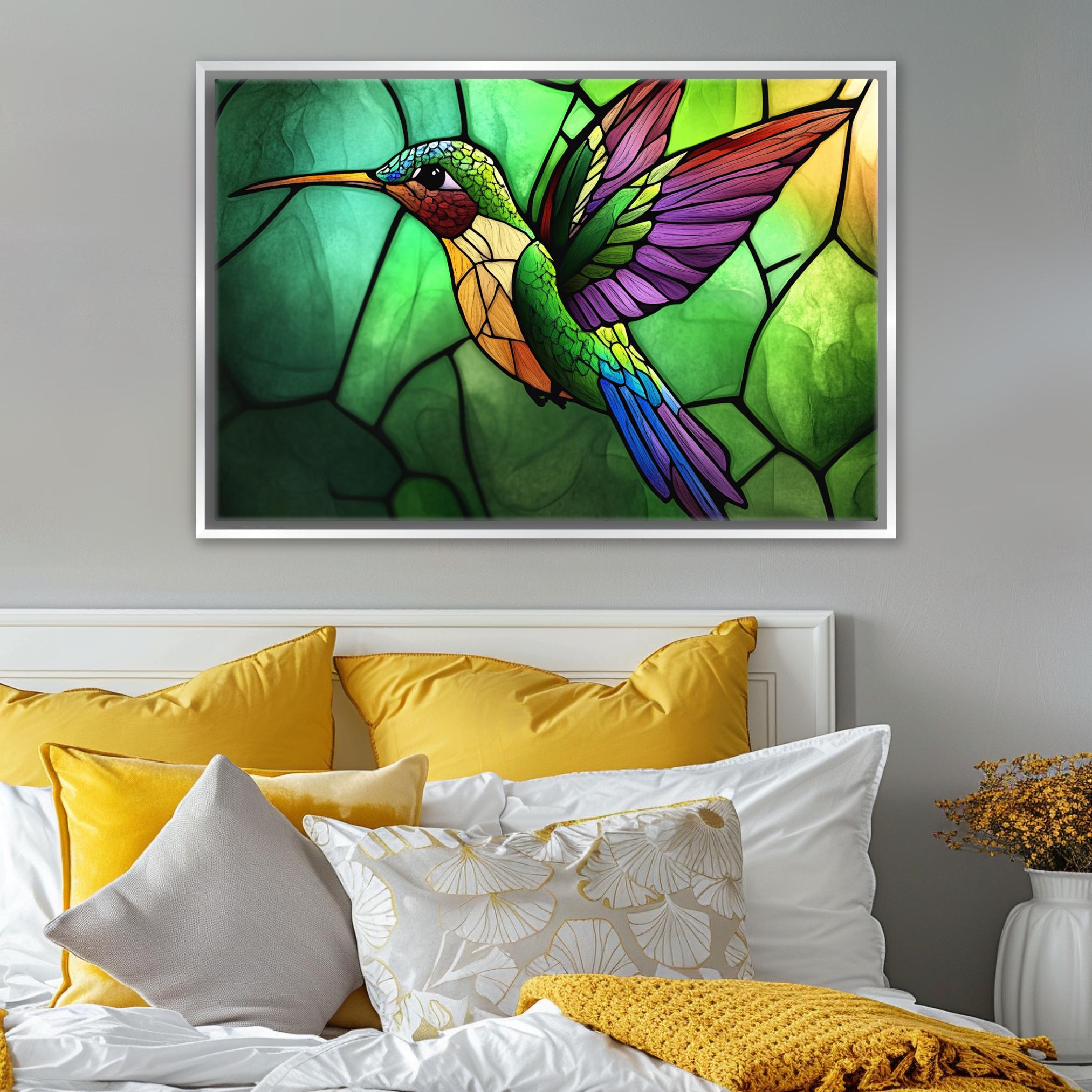 a picture of a hummingbird on a stained glass window