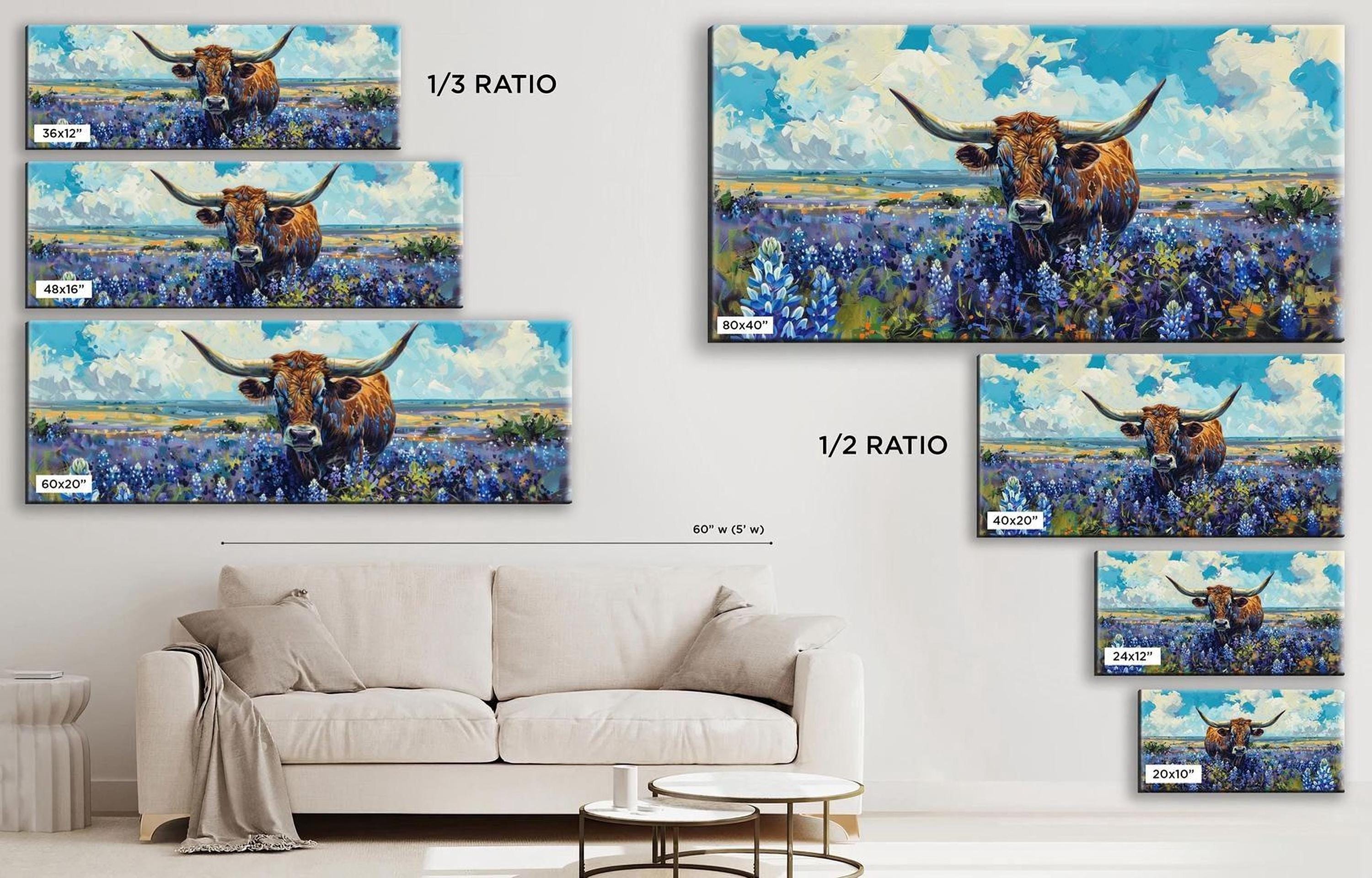 a living room with a couch and paintings on the wall