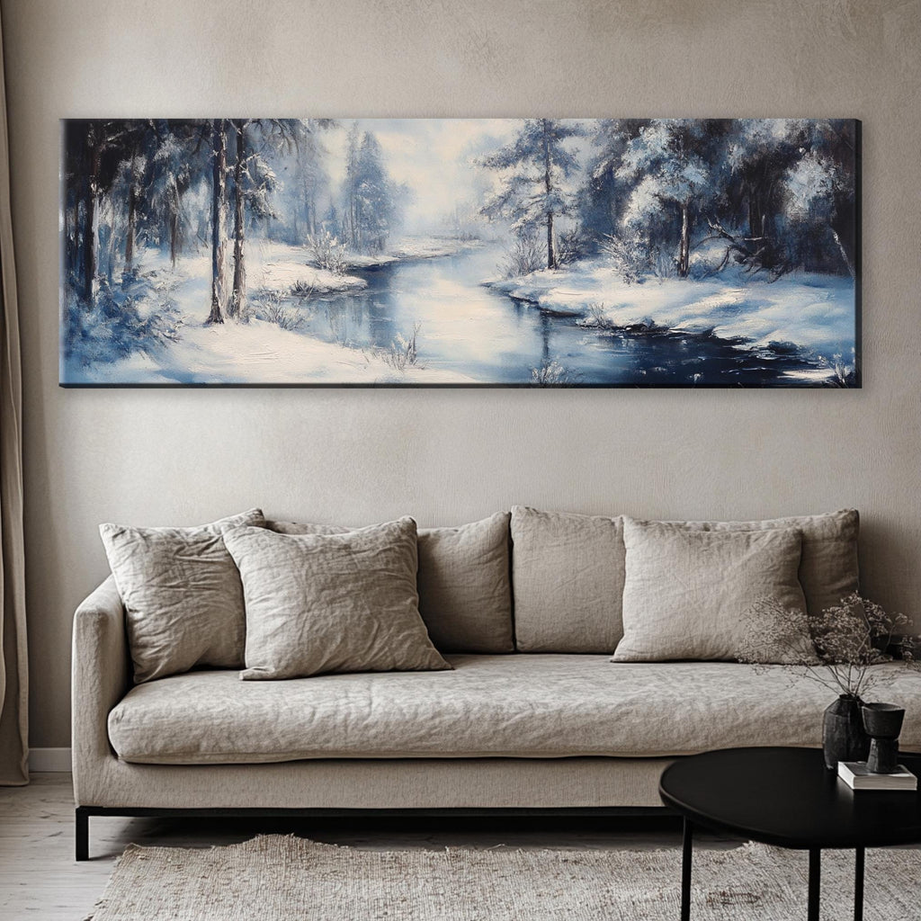 a living room with a couch and a painting on the wall