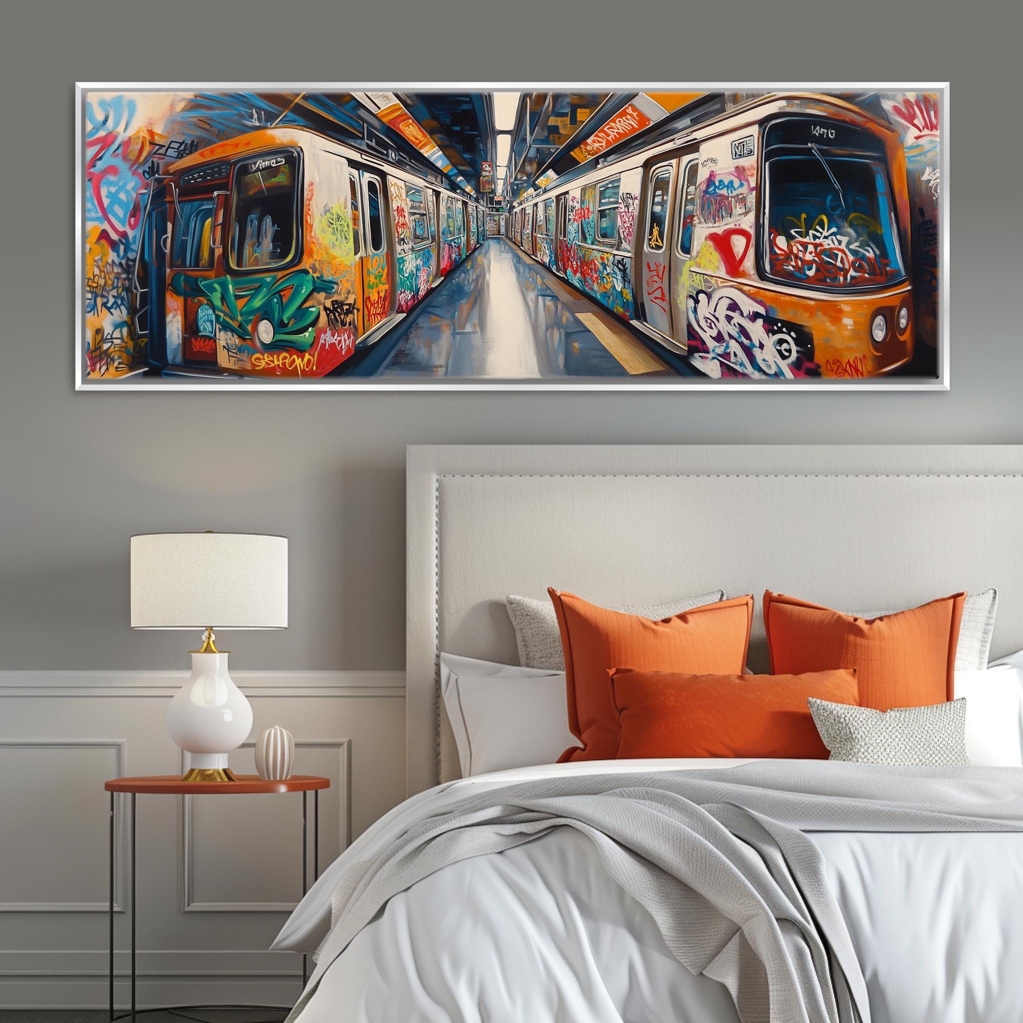 a bedroom with a painting on the wall above the bed