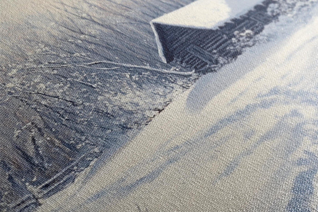 a piece of fabric with a building in the background