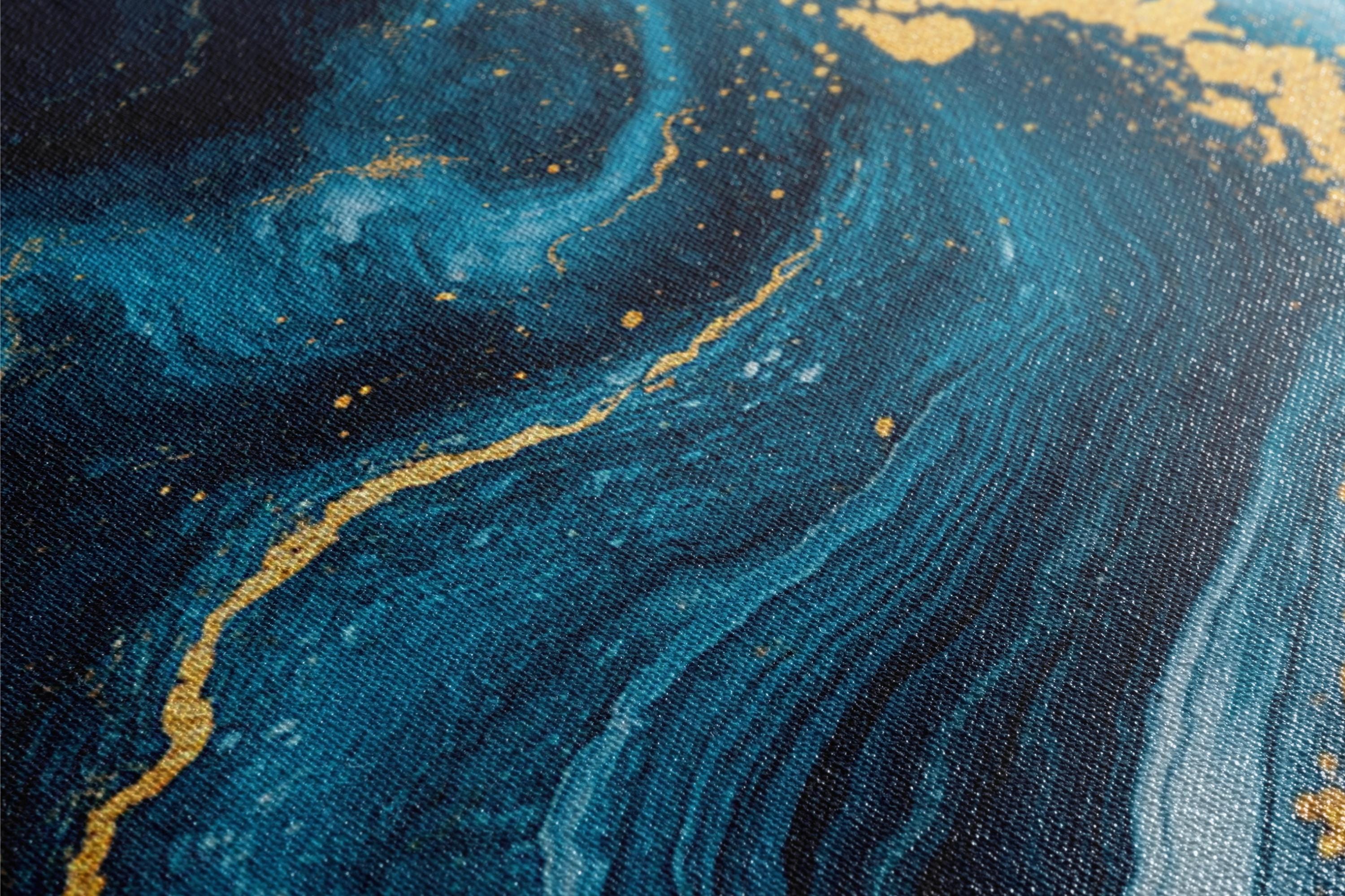 a close up of a blue and yellow painting