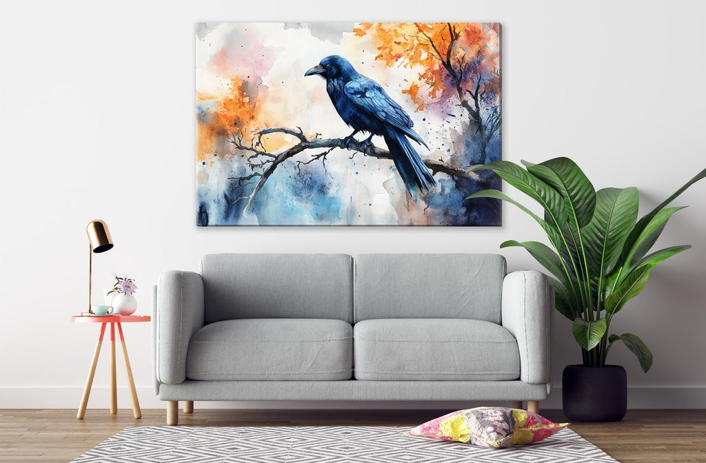 a gray sofa in a living room with a large painting of a blue bird perched on a branch hanging above it.