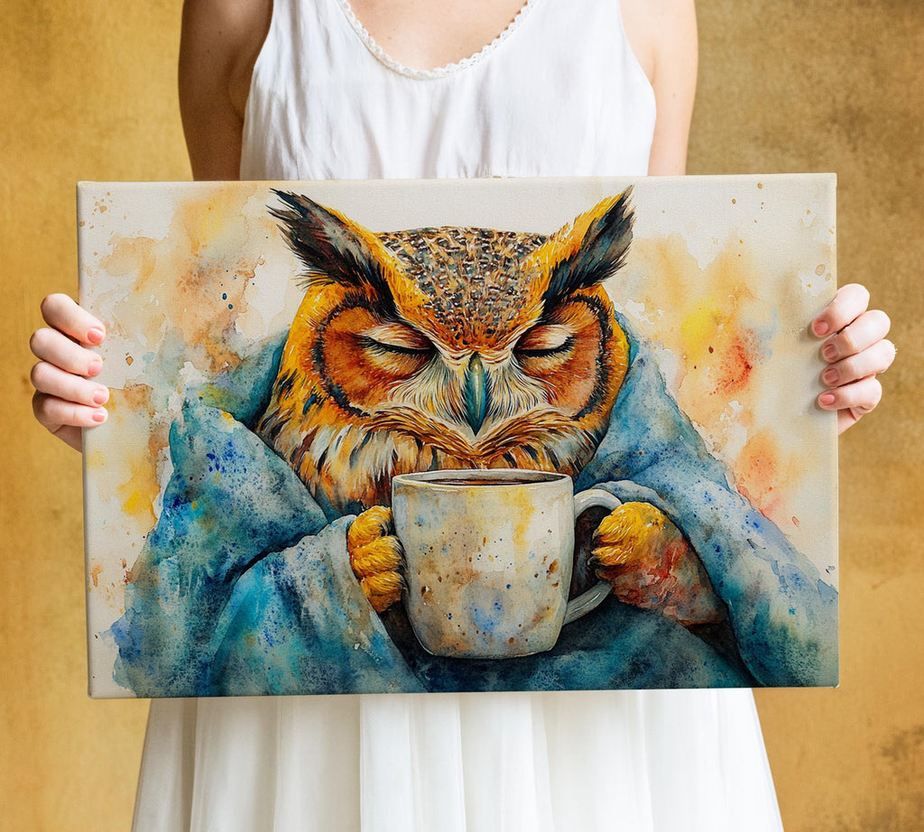 A person is holding a framed painting depicting an owl drinking from a mug.