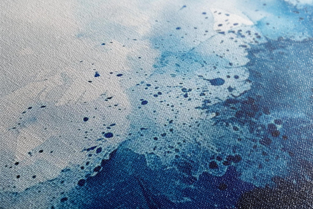 a close up of a blue and white painting