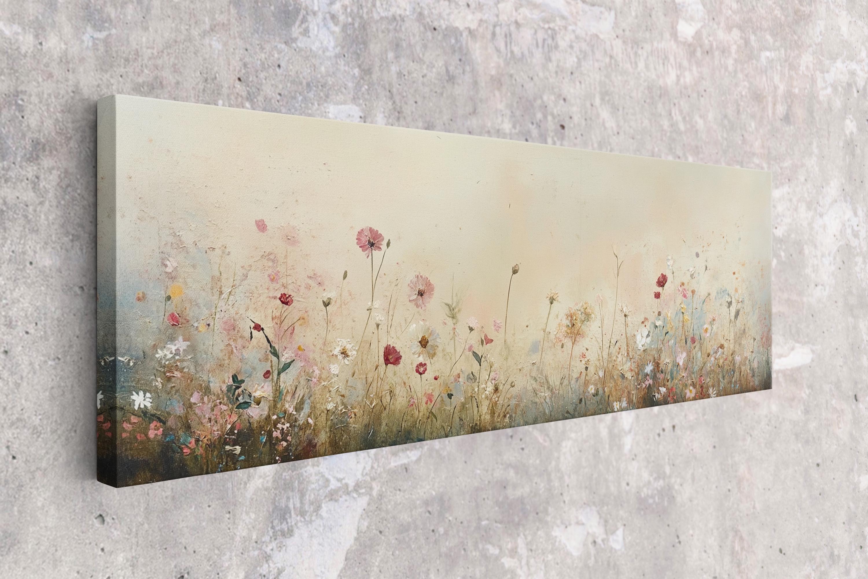 a painting of a field of flowers on a wall