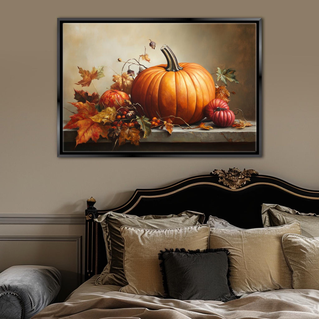 a large framed painting of a pumpkin and autumn leaves on a wall above a bed with a black headboard and beige bedding.