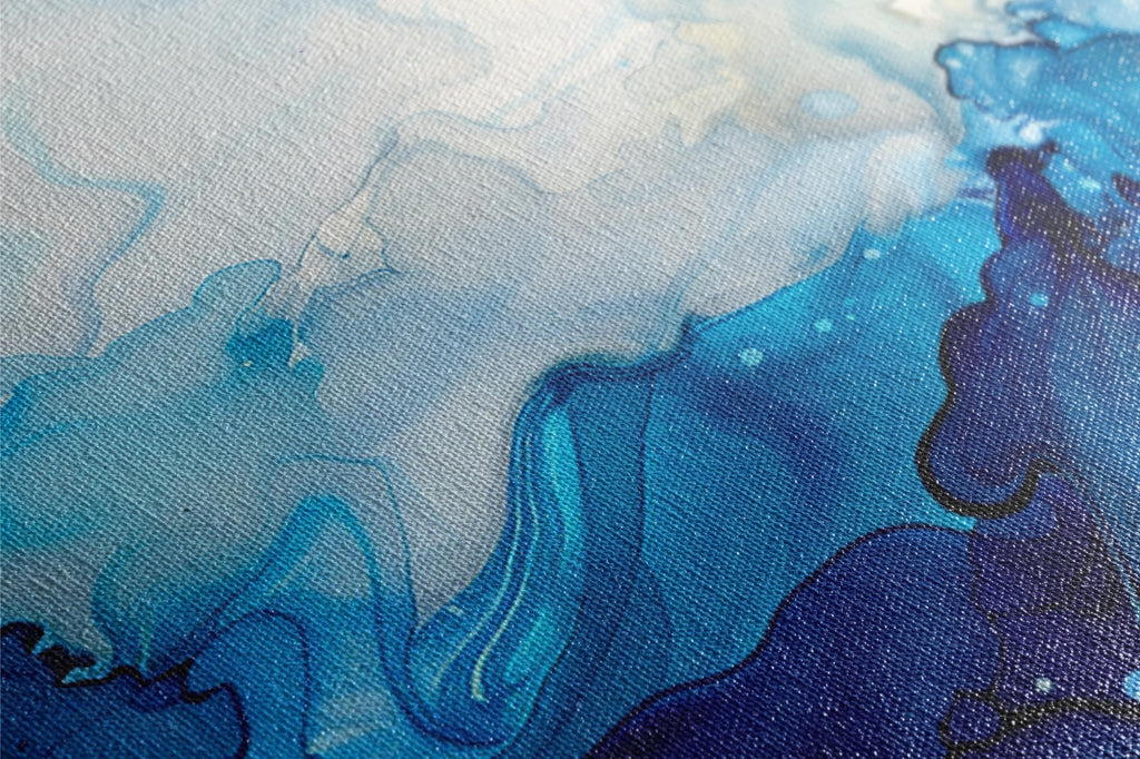 a close up of a painting with blue and white colors