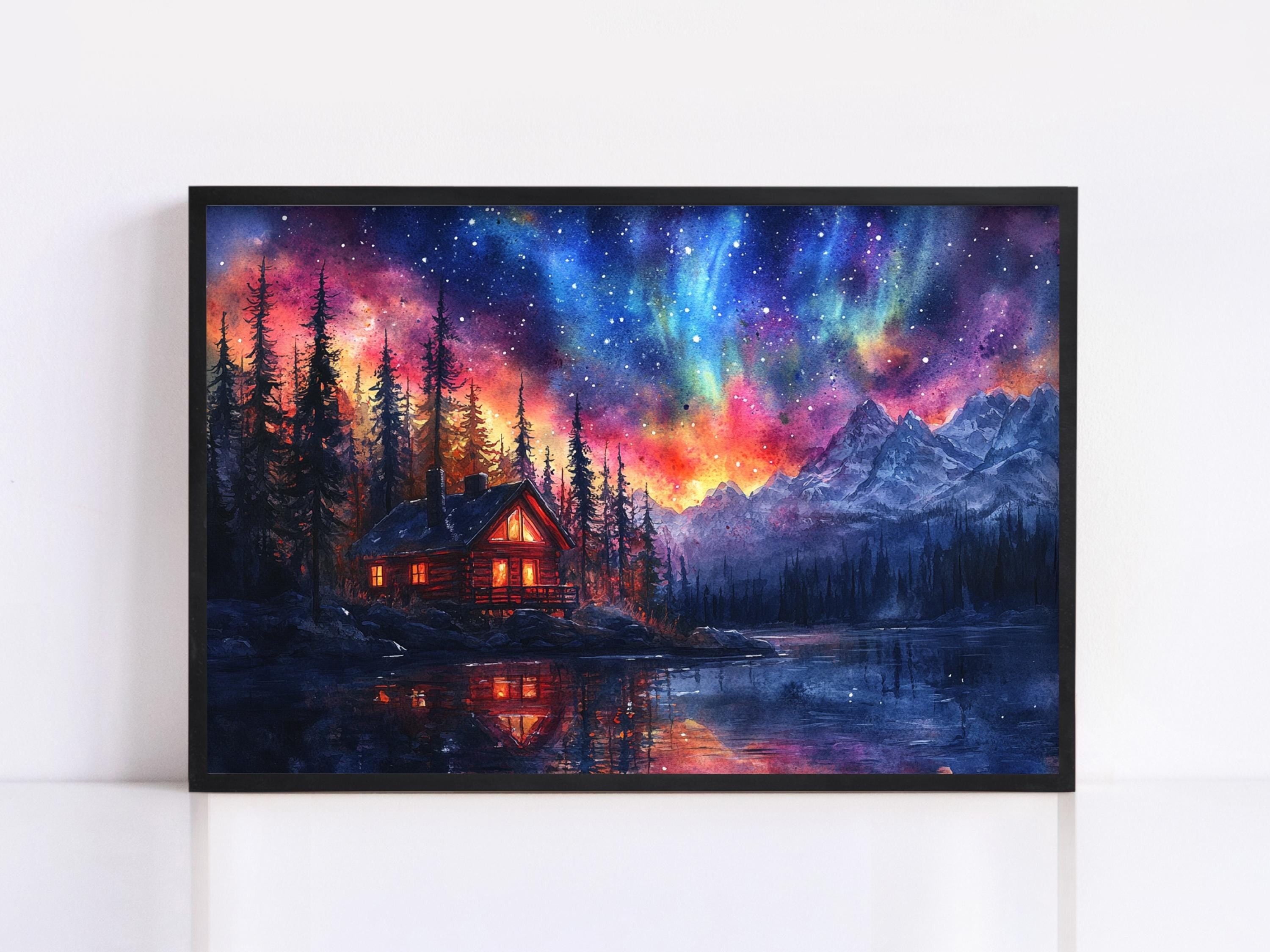 A framed painting depicting a serene mountain landscape at night, with a cabin illuminated by warm lights and surrounded by pine trees. The sky is filled with vibrant colors and stars, creating a breathtaking and peaceful atmosphere.