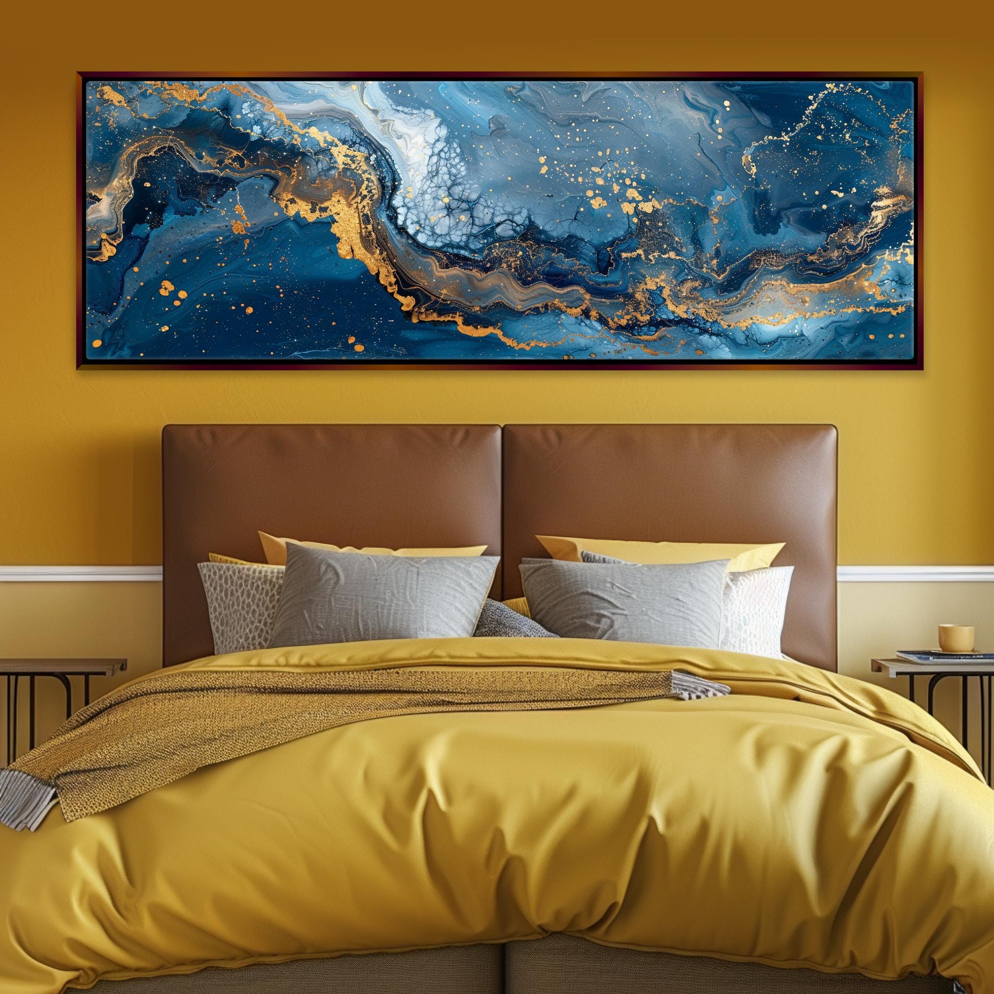 a bedroom with a large painting on the wall above the bed