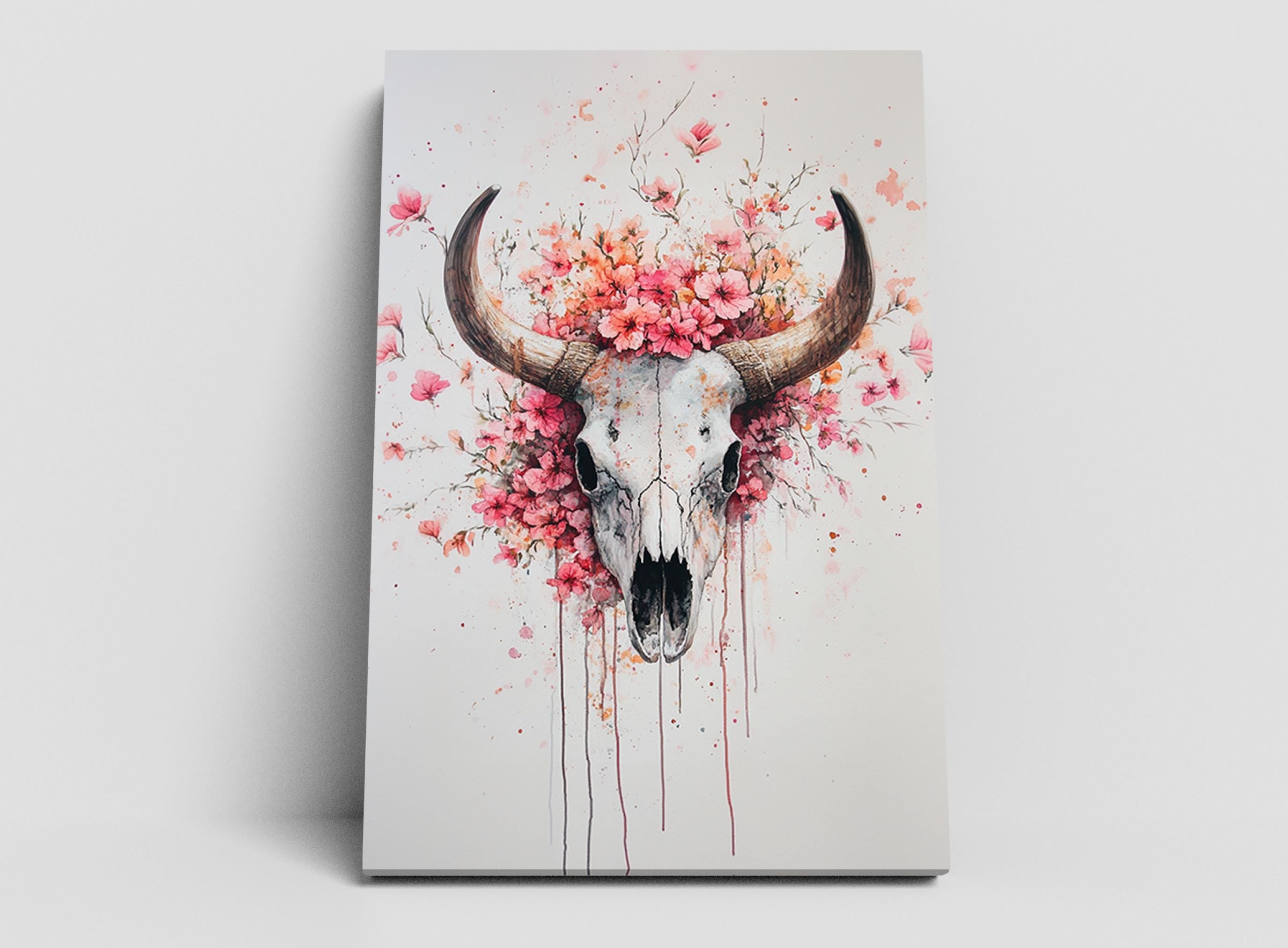 a skull with large horns, surrounded by a vibrant floral arrangement of pink and orange flowers.