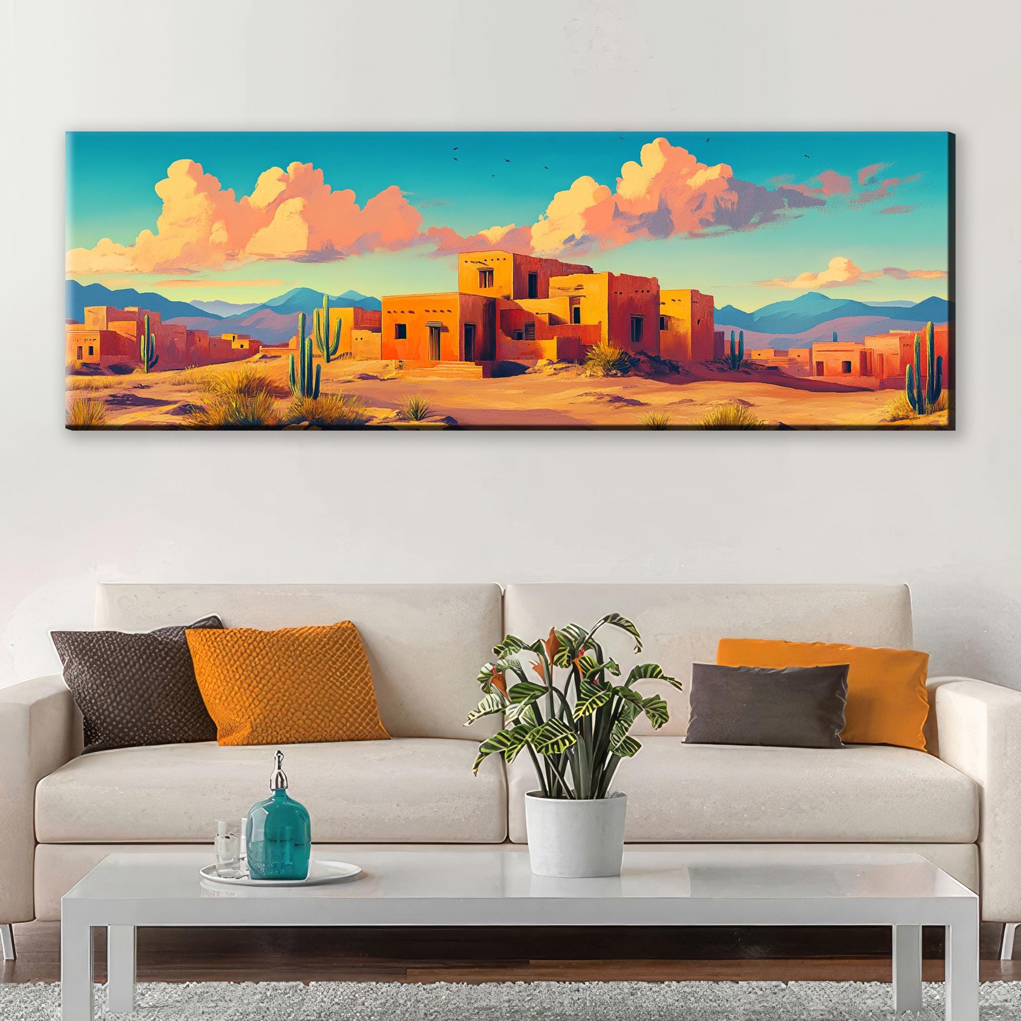 a living room with a couch and a painting on the wall