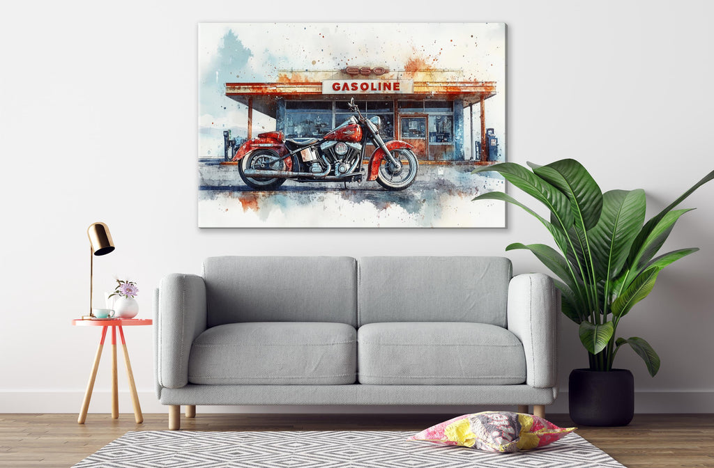 a gray sofa in a living room with a large painting of a red motorcycle in front of a gas station on the wall above it.