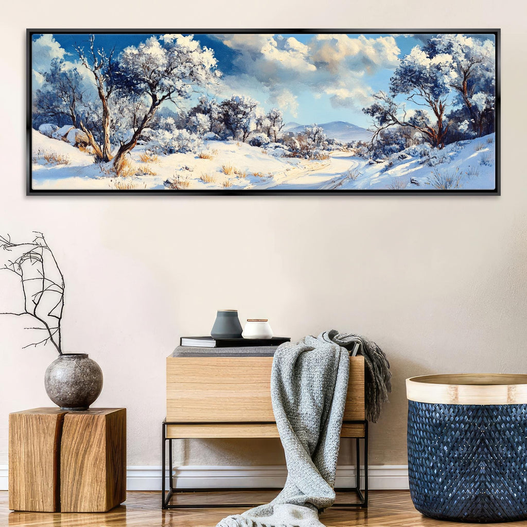a painting of a snowy landscape on a wall