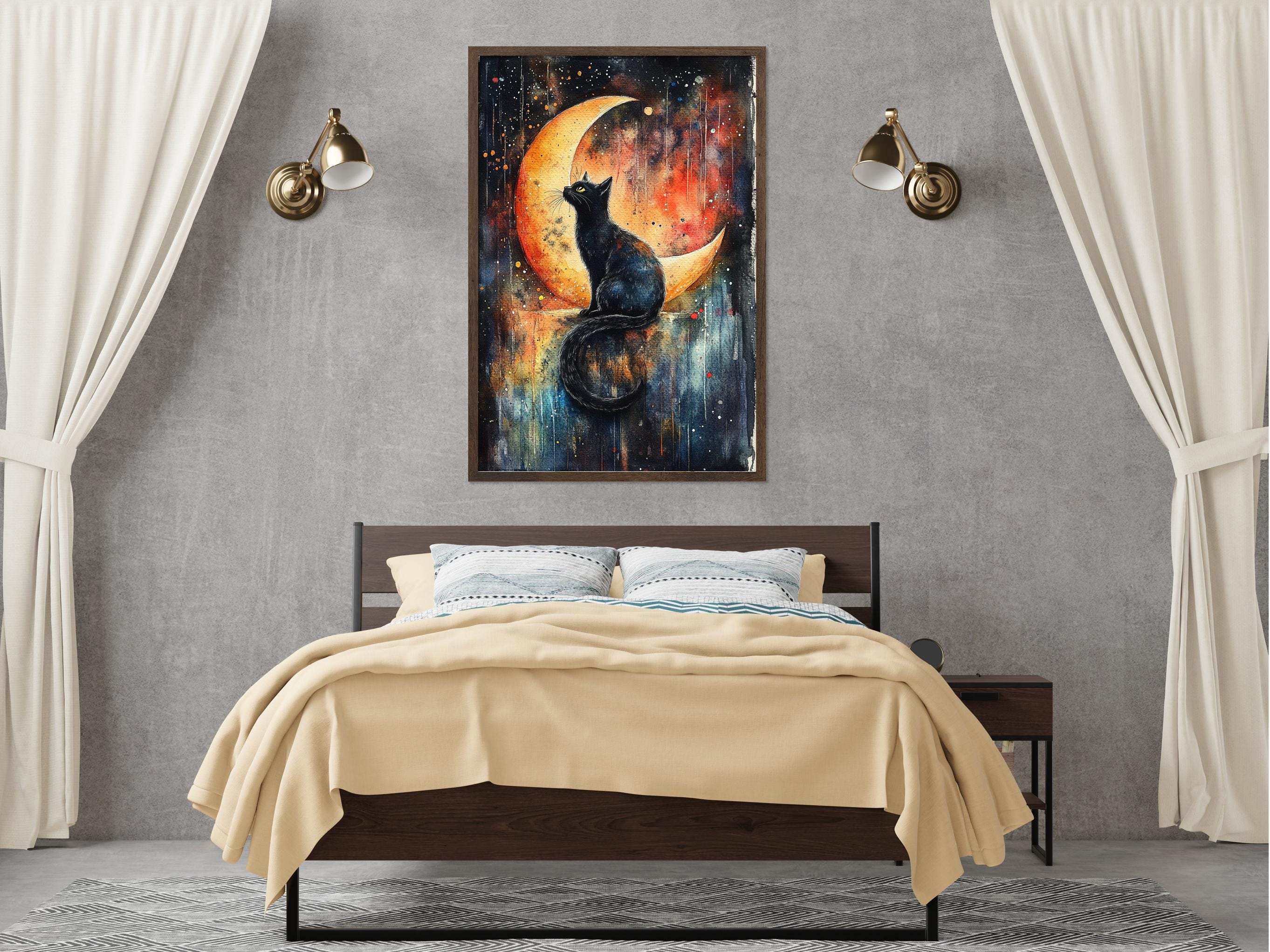 a bedroom with a large bed, a nightstand, and a framed painting of a cat sitting on a crescent moon.