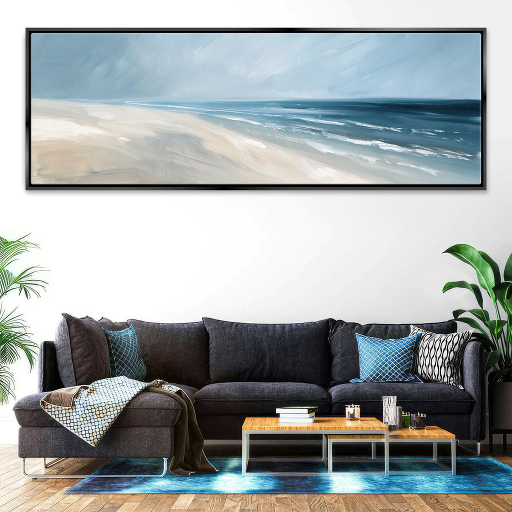 a living room with a couch and a painting on the wall