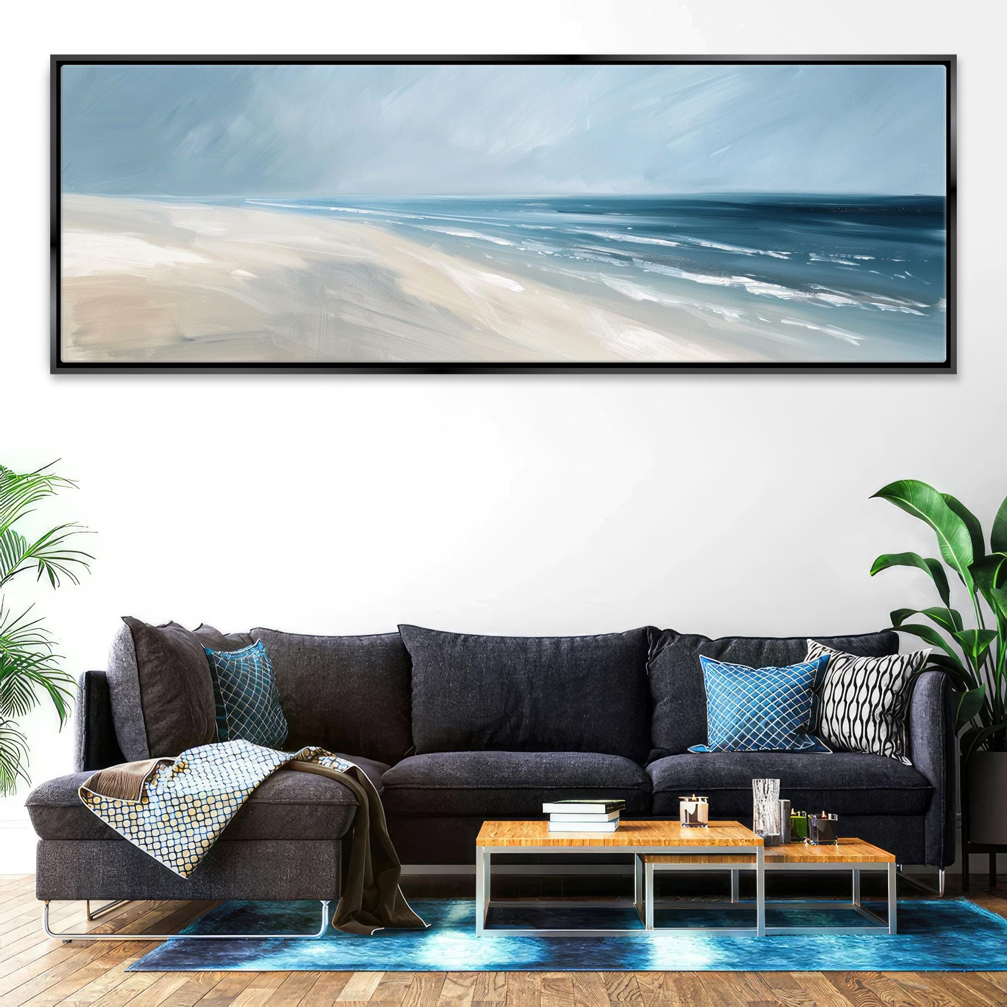 a living room with a couch and a painting on the wall