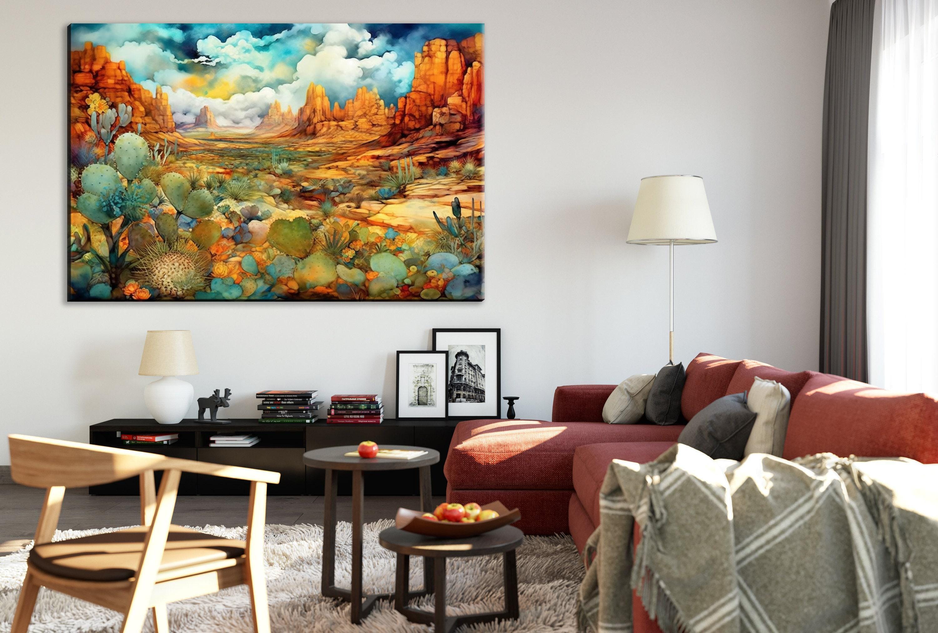 a cozy living room with a large, colorful painting of a desert landscape hanging on the wall. The room is furnished with a red couch, a wooden chair, and a coffee table with a bowl of fruit. The overall atmosphere of the room is warm and inviting, with the painting adding a vibrant touch to the space.