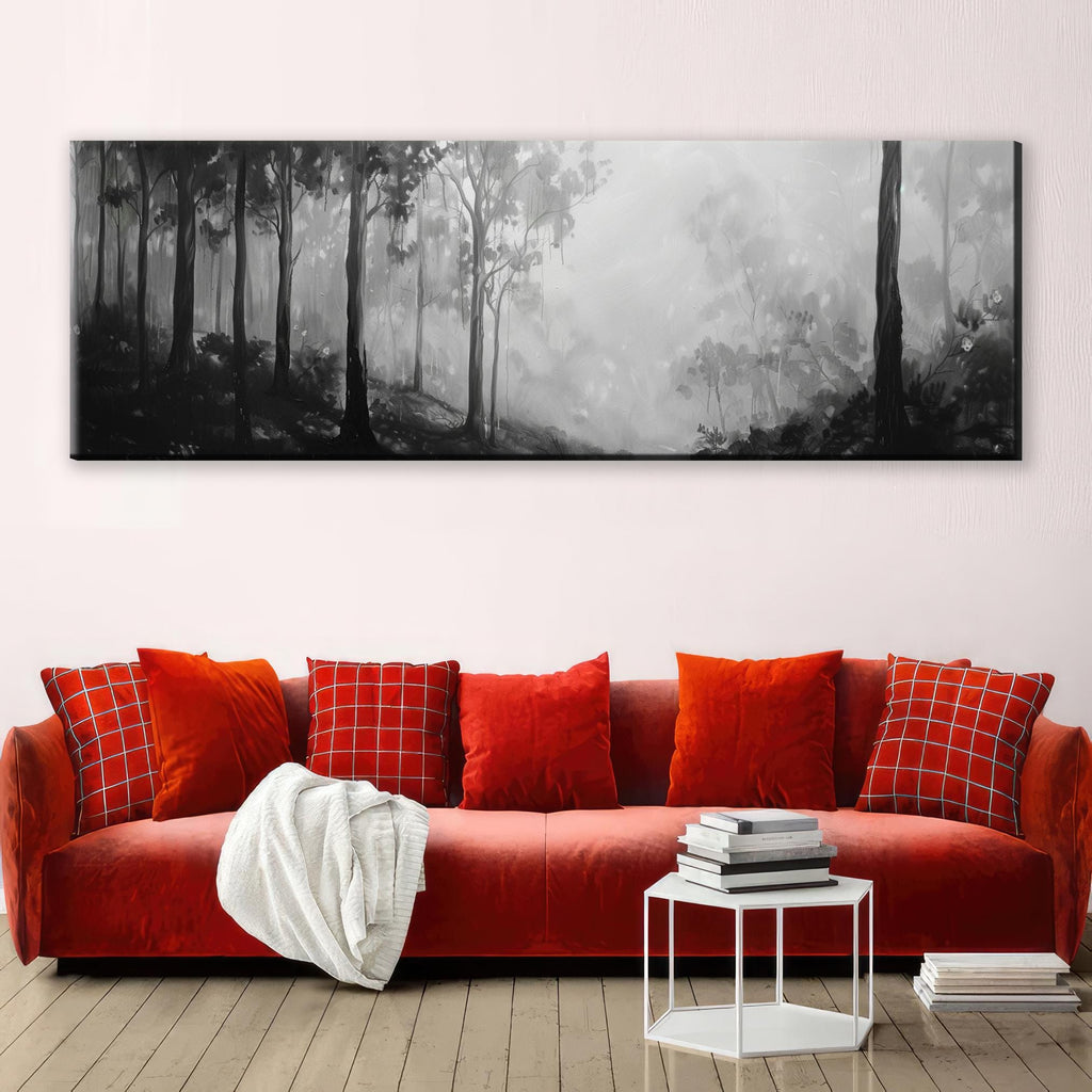 a living room with a red couch and a painting on the wall