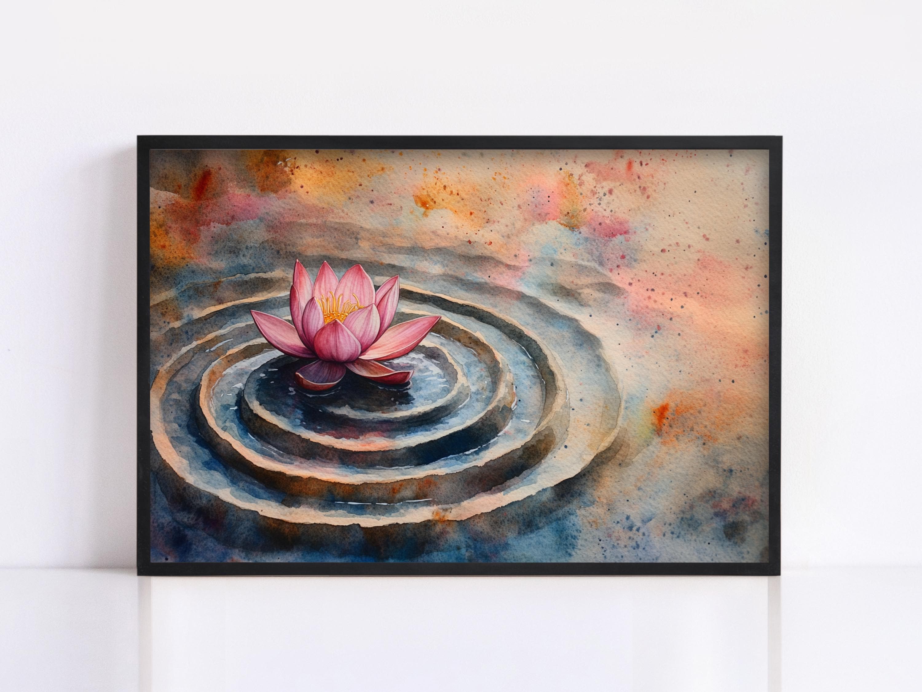 A framed painting depicting a pink lotus flower floating on a rippled surface, surrounded by a colorful abstract background.