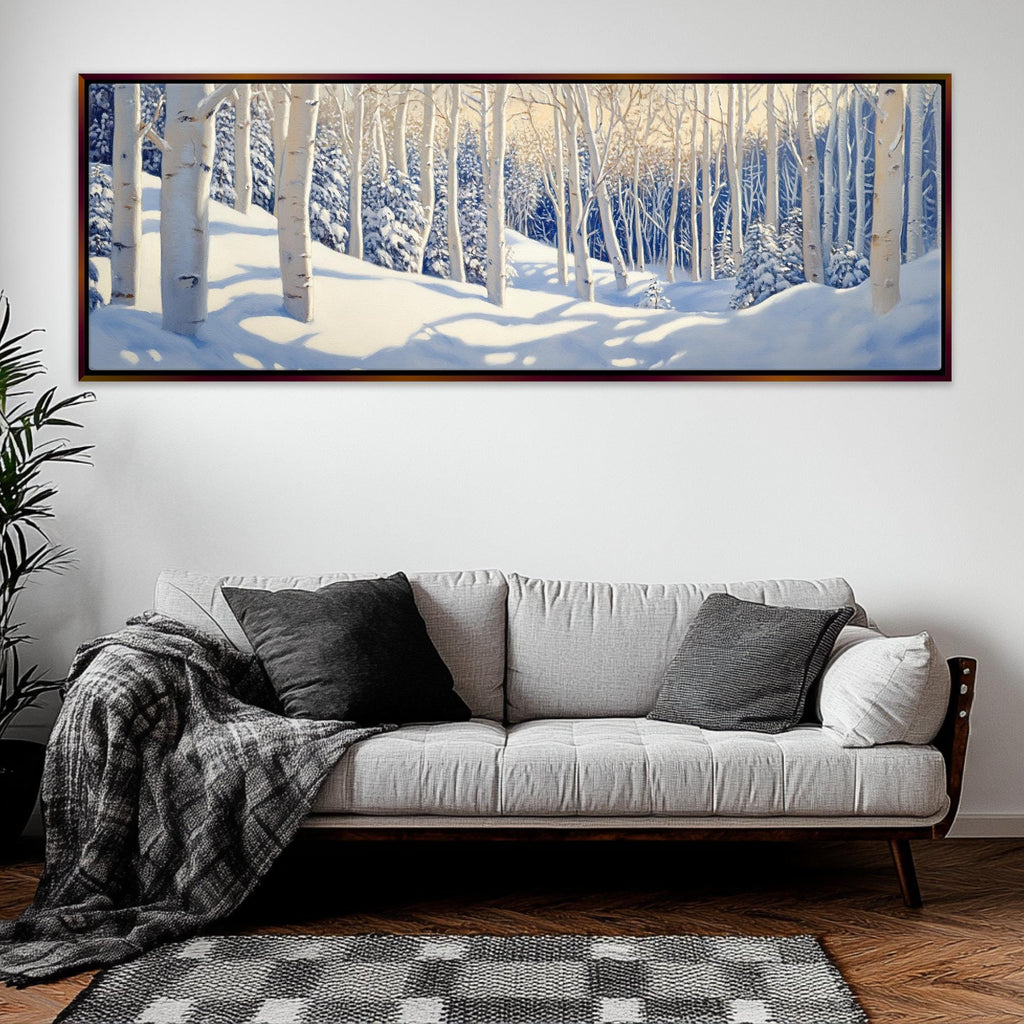 a living room with a couch and a painting on the wall