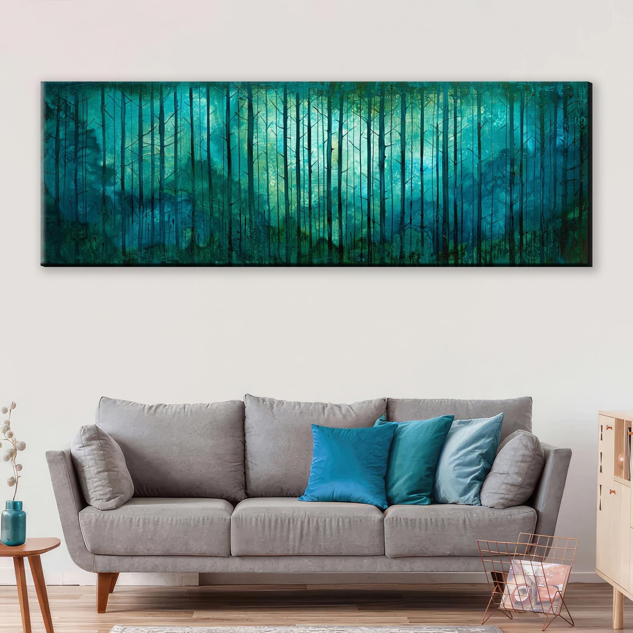 a living room with a couch and a painting on the wall
