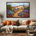 a living room with a couch and a painting on the wall