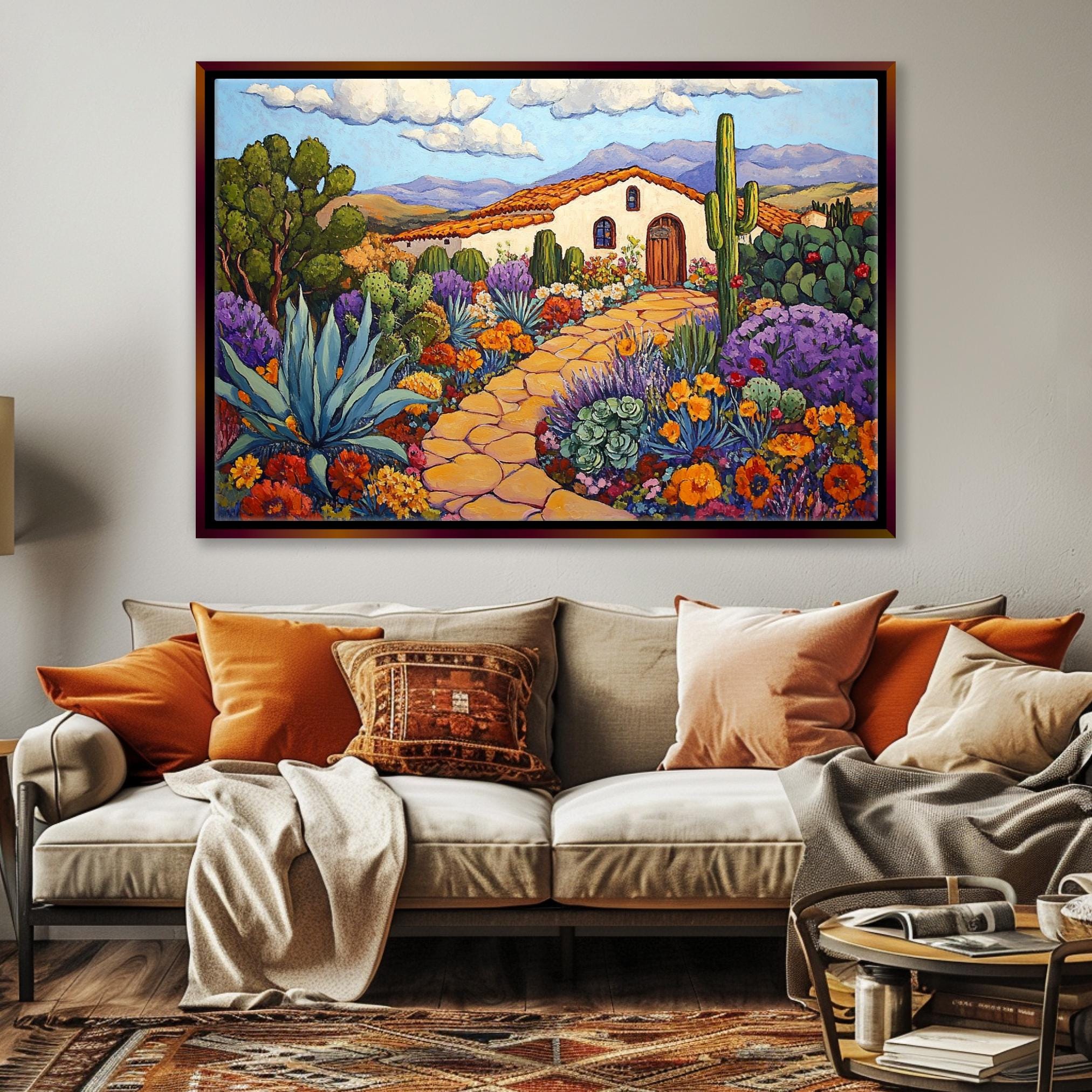 a living room with a couch and a painting on the wall