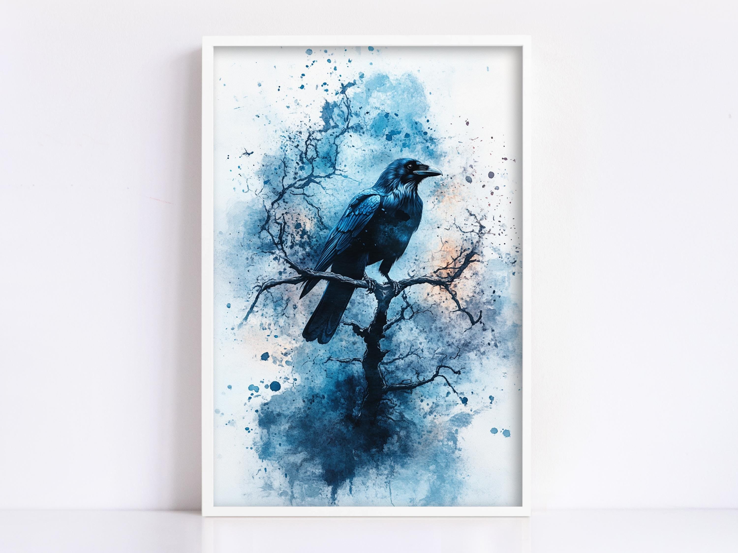 A framed painting depicting a black bird perched on a tree branch, with splashes of blue and white paint surrounding the bird.