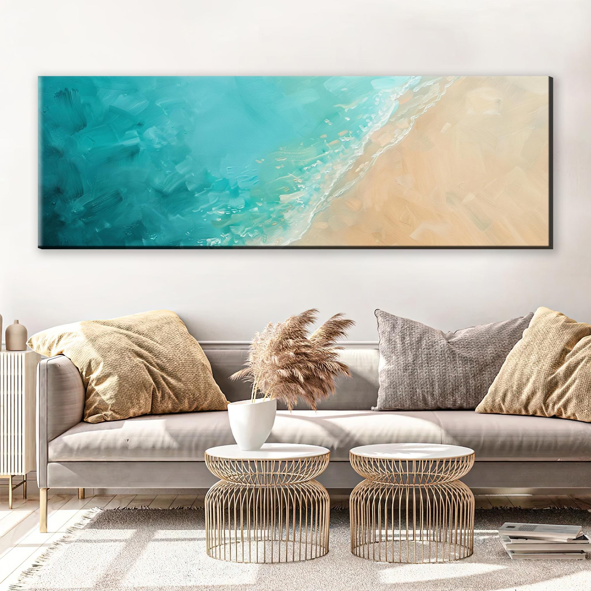 a living room with a couch and a painting on the wall