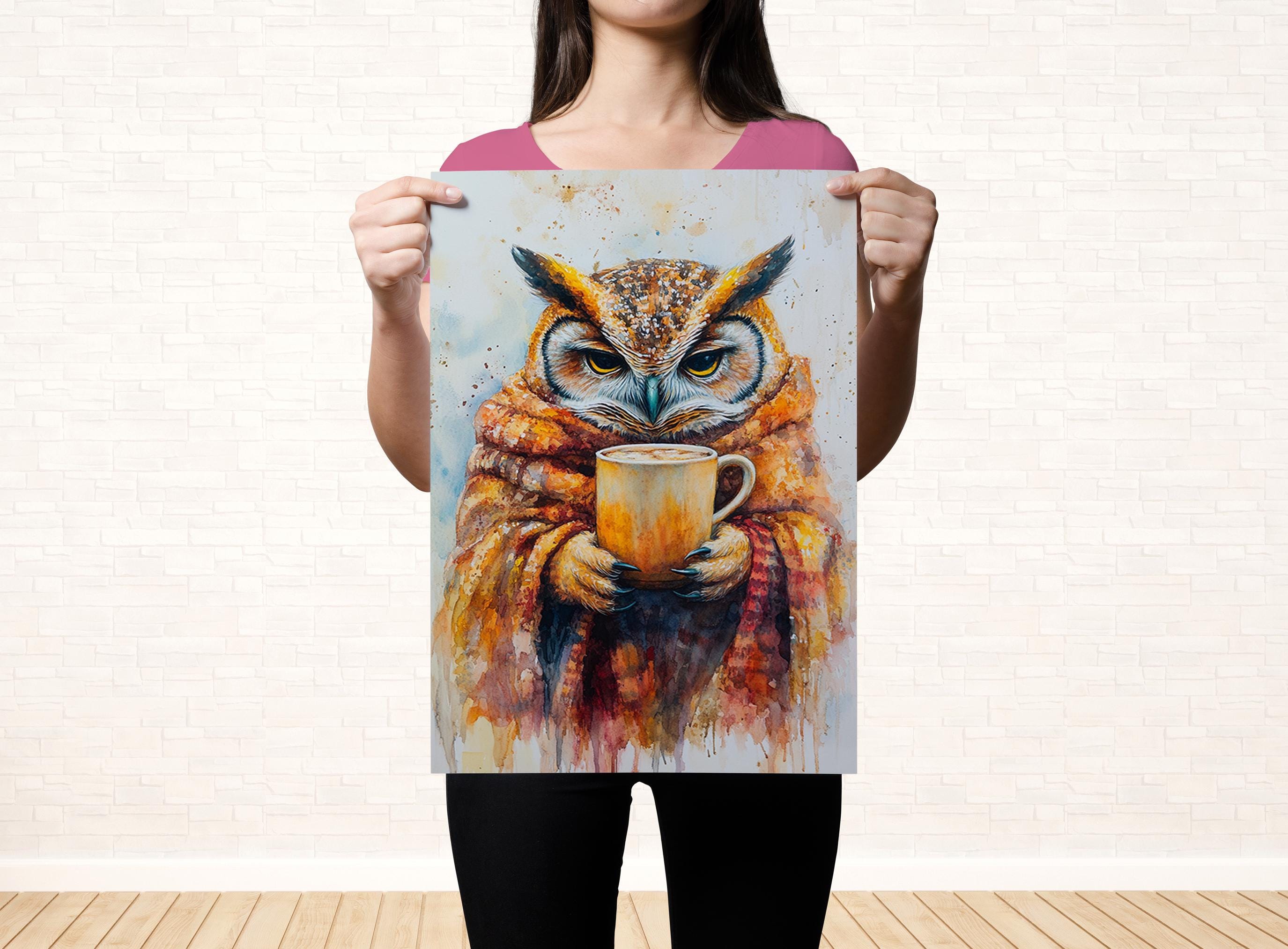 A woman holds up a poster featuring an owl holding a cup of coffee.