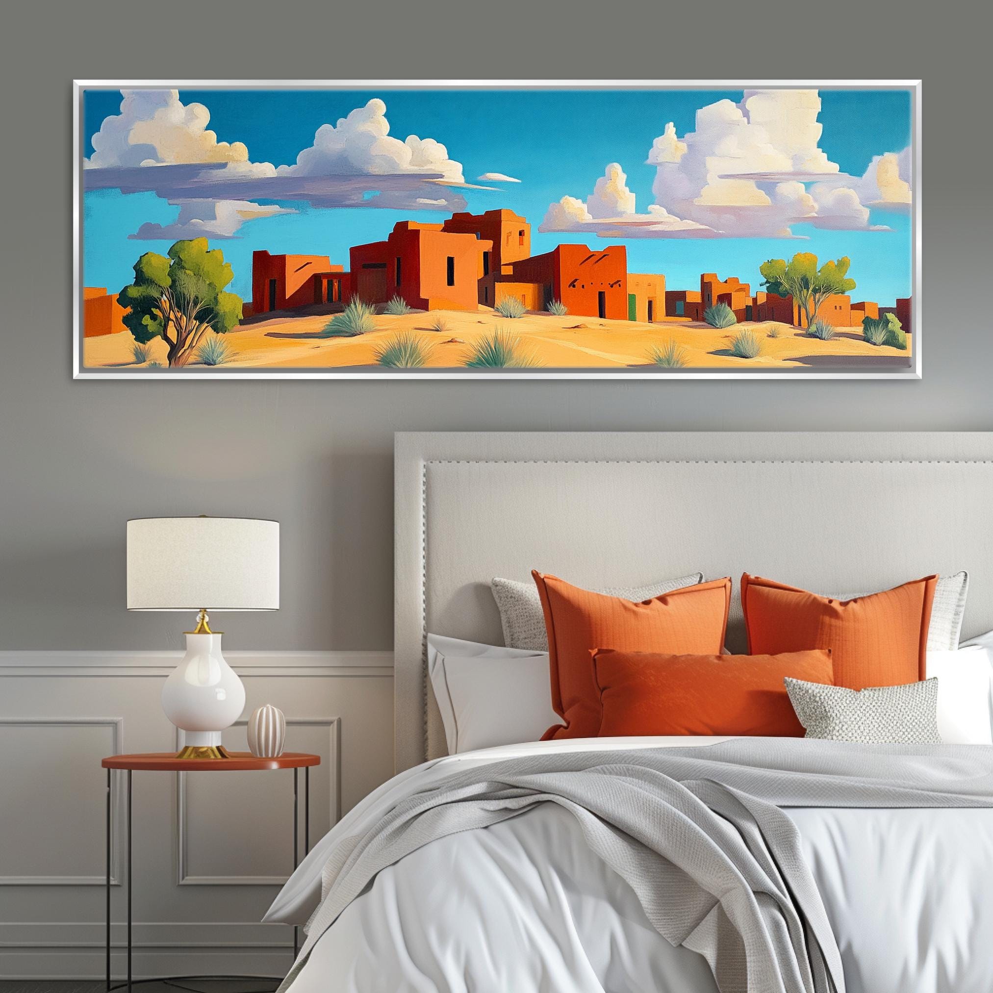 a bedroom with a large painting on the wall above the bed