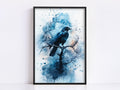 A framed print depicting a black bird perched on a branch, with a blue and white watercolor-style background.