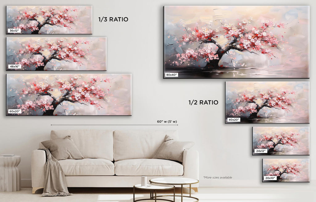 a living room with a white couch and a painting on the wall
