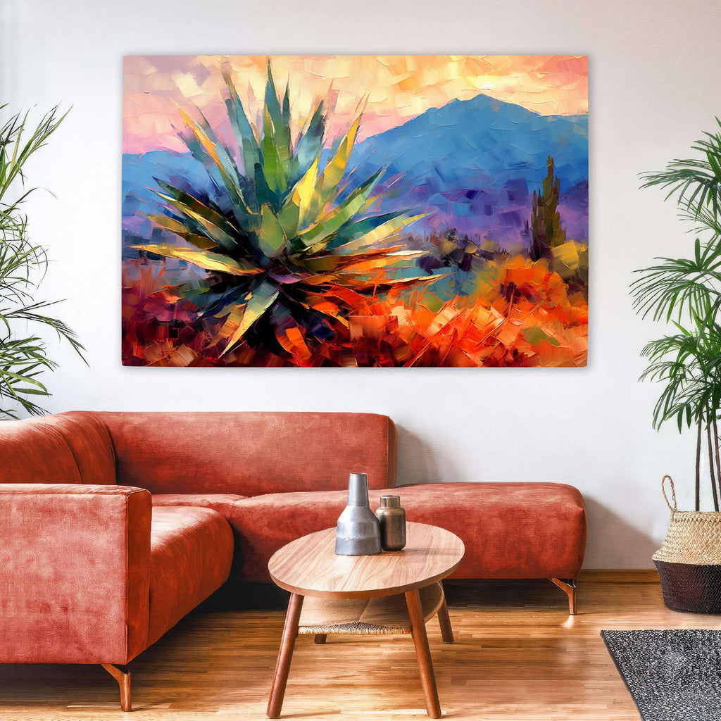 a large, colorful painting of a desert landscape hanging on a wall above a red sofa in a cozy living room setting.