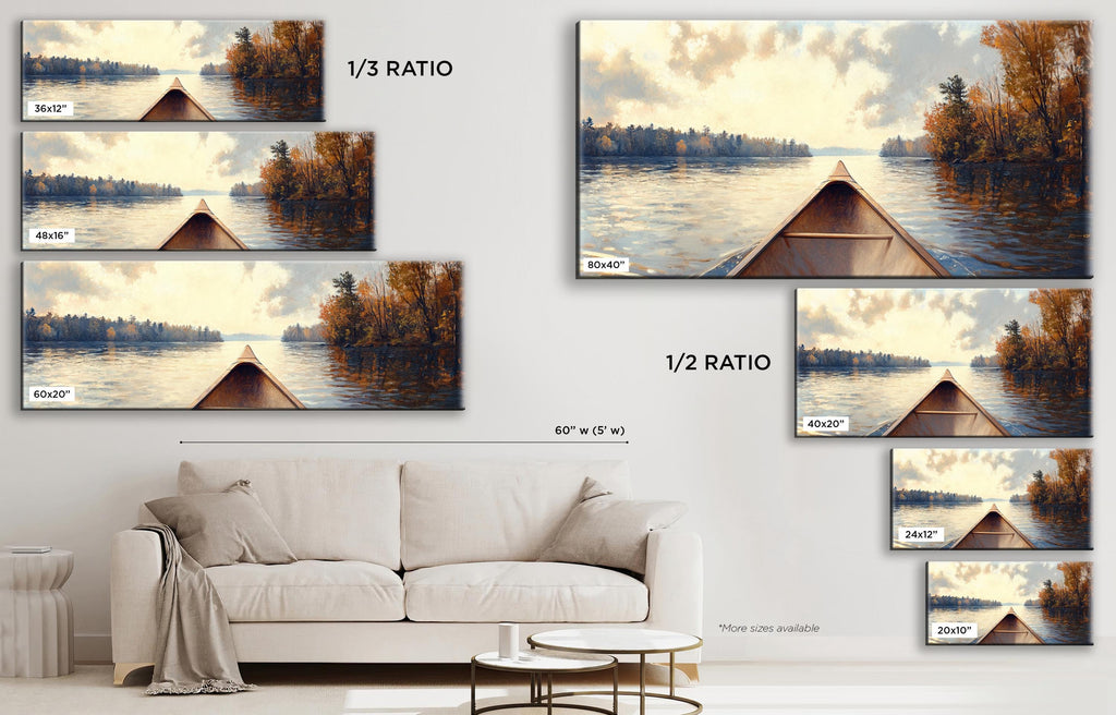 a living room with a white couch and a painting on the wall