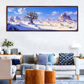 a living room with a couch and a painting on the wall