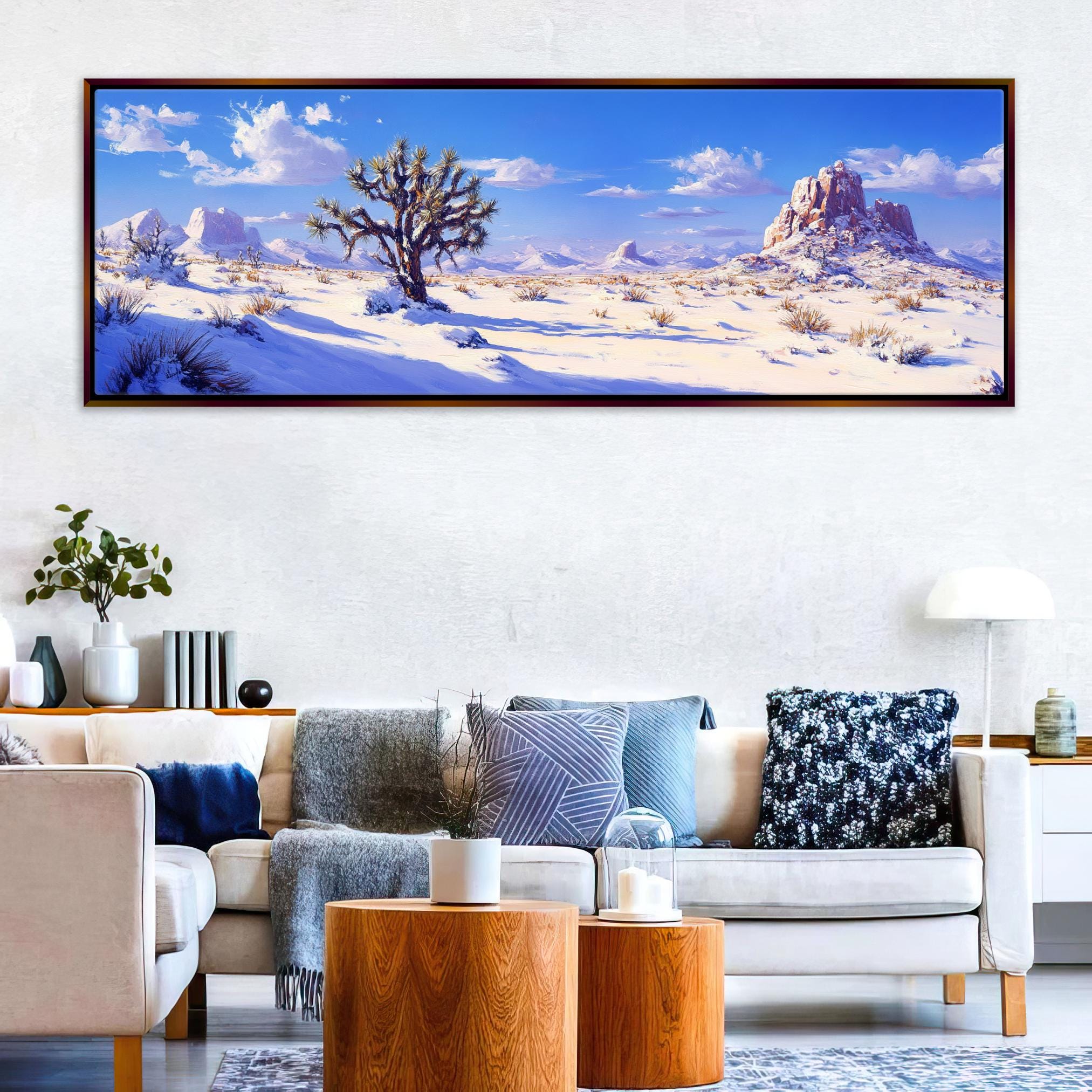 a living room with a couch and a painting on the wall