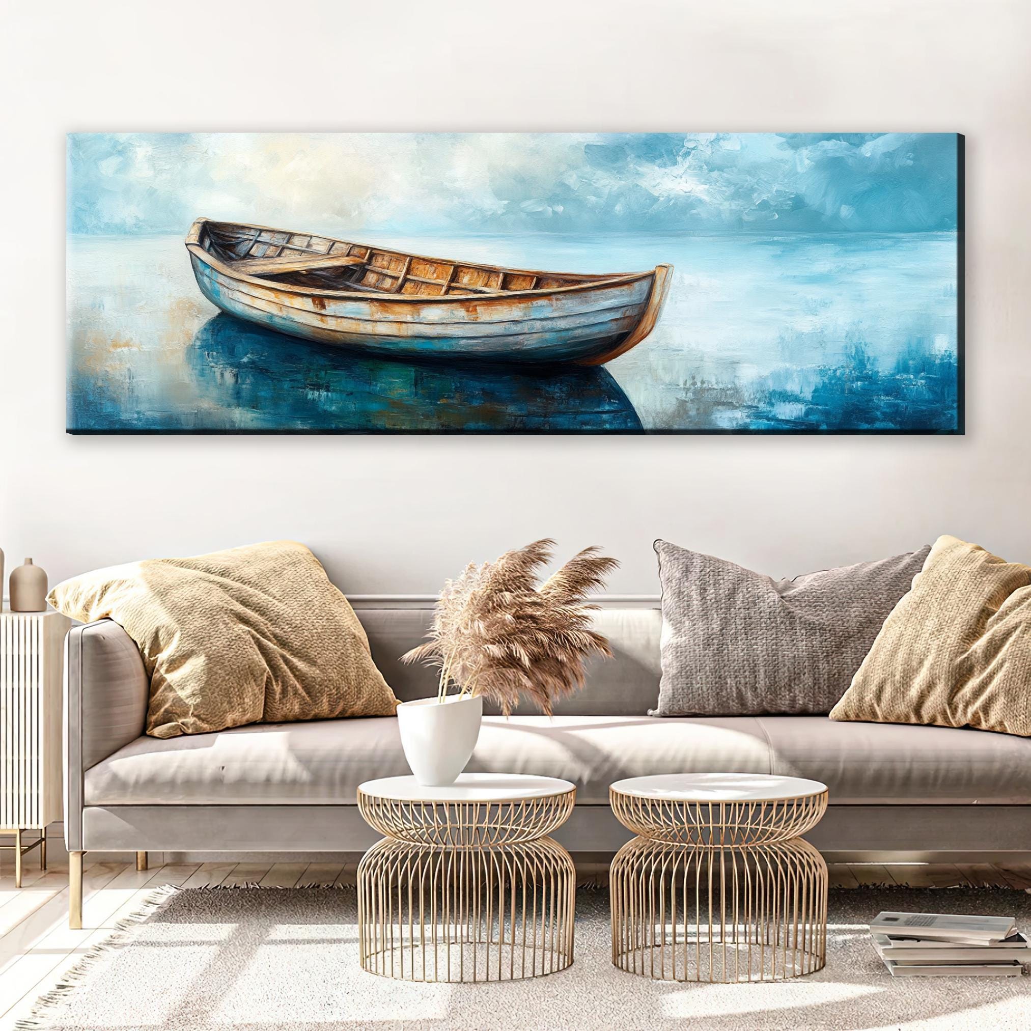 a living room with a couch and a painting on the wall