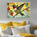 a picture of a hummingbird on a stained glass window