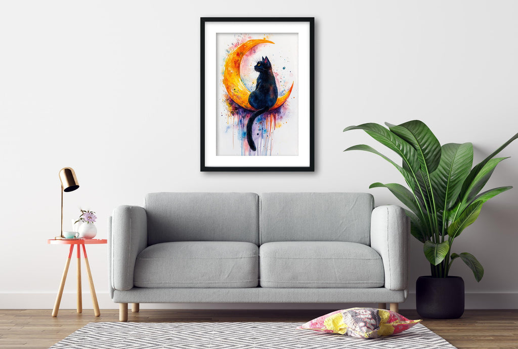 a gray sofa, a framed painting of a cat on a crescent moon, a potted plant, and a small table with a lamp.