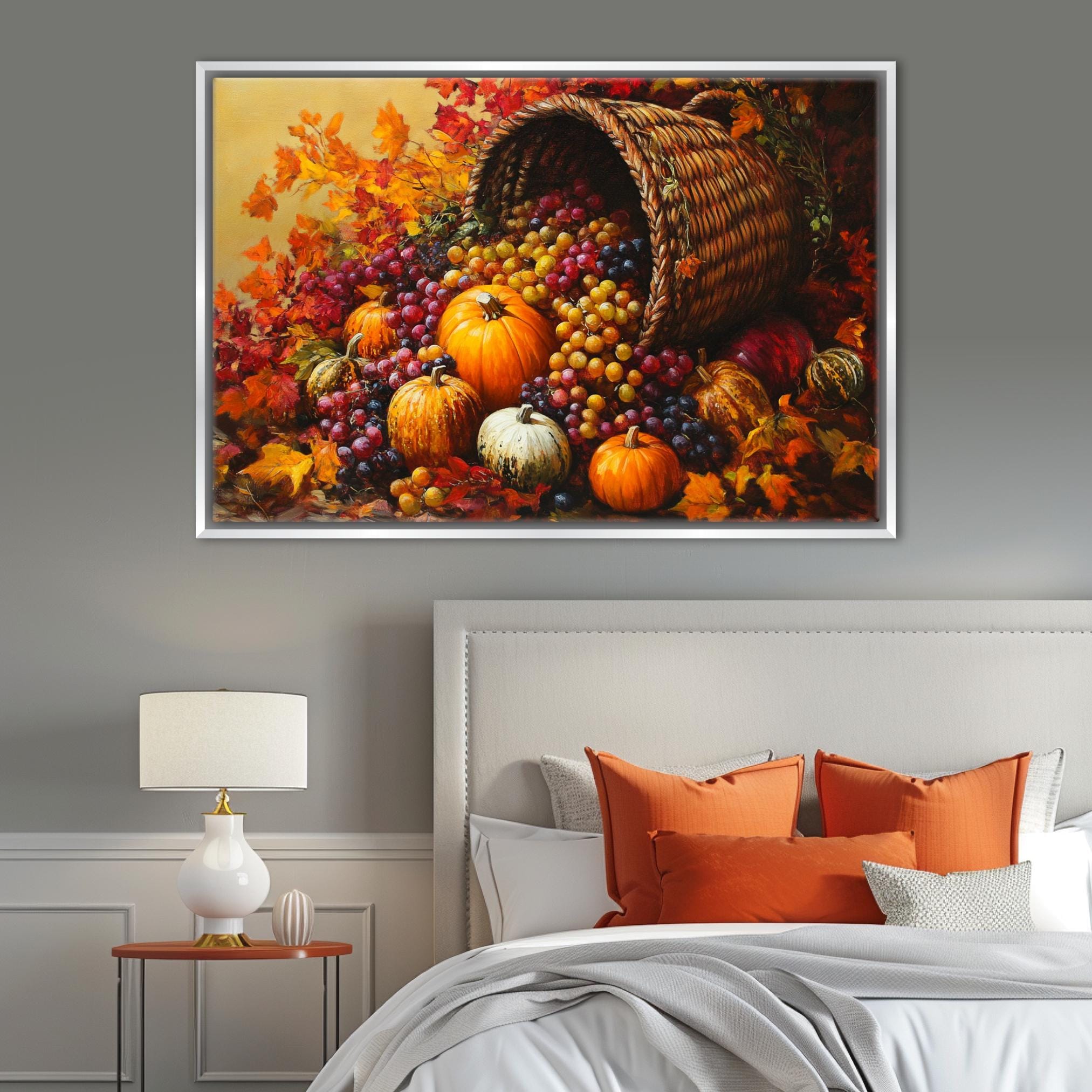 a cozy bedroom scene with a bed adorned with orange pillows and a white headboard. Above the bed, a large painting or collage of various fruits and vegetables, including pumpkins, grapes, and apples, is displayed on the wall.