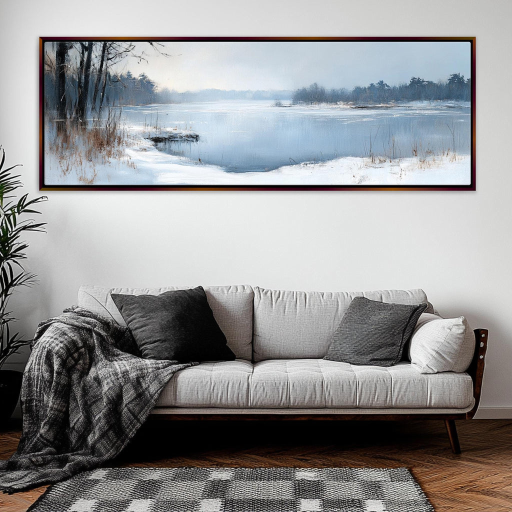 a living room with a couch and a painting on the wall