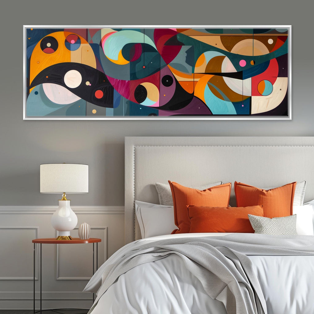 a bedroom with a large painting above the bed