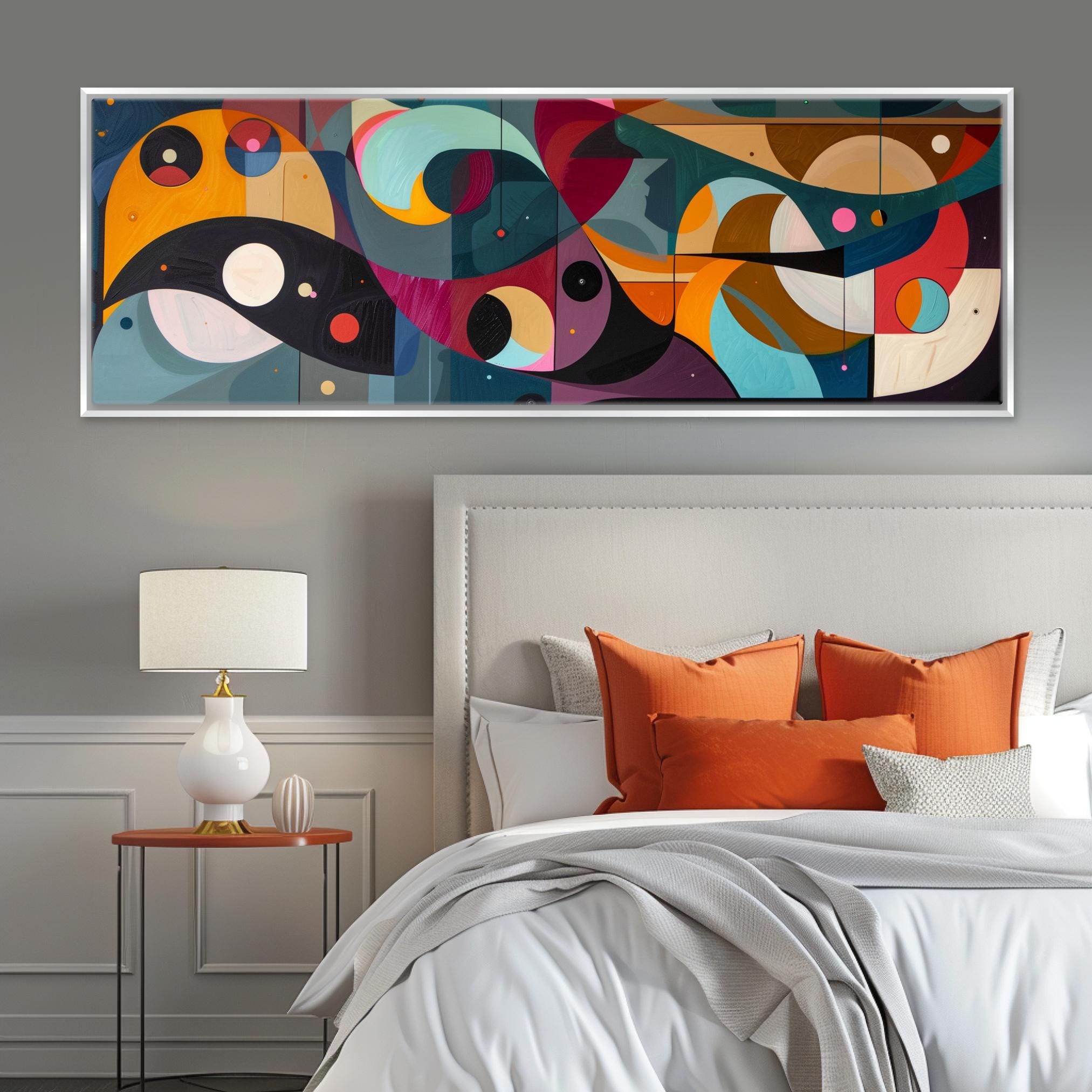 a bedroom with a large painting above the bed