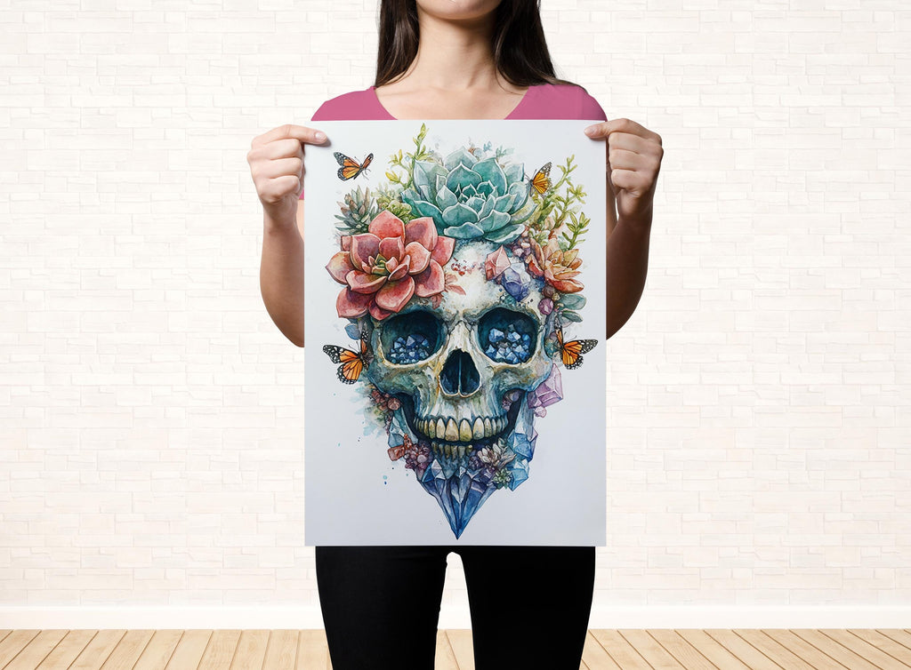 A woman holds up a colorful and intricate skull-themed artwork featuring a floral design.