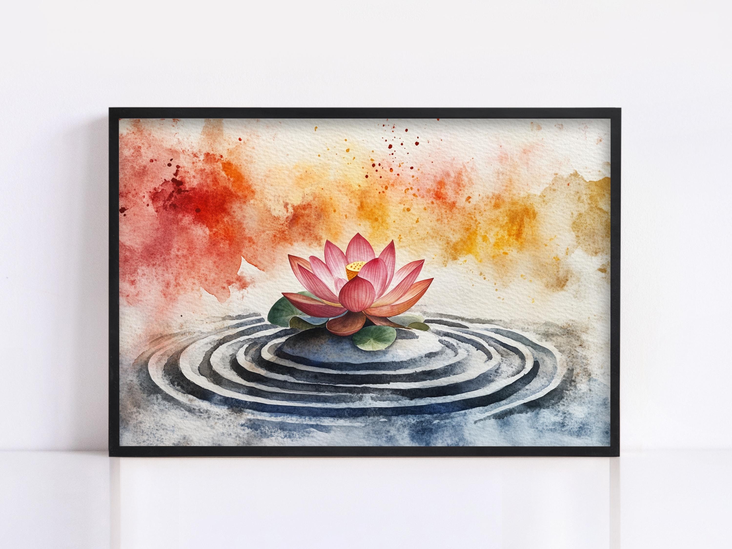 A framed watercolor painting depicting a pink lotus flower floating on a rippled surface, with a colorful abstract background.