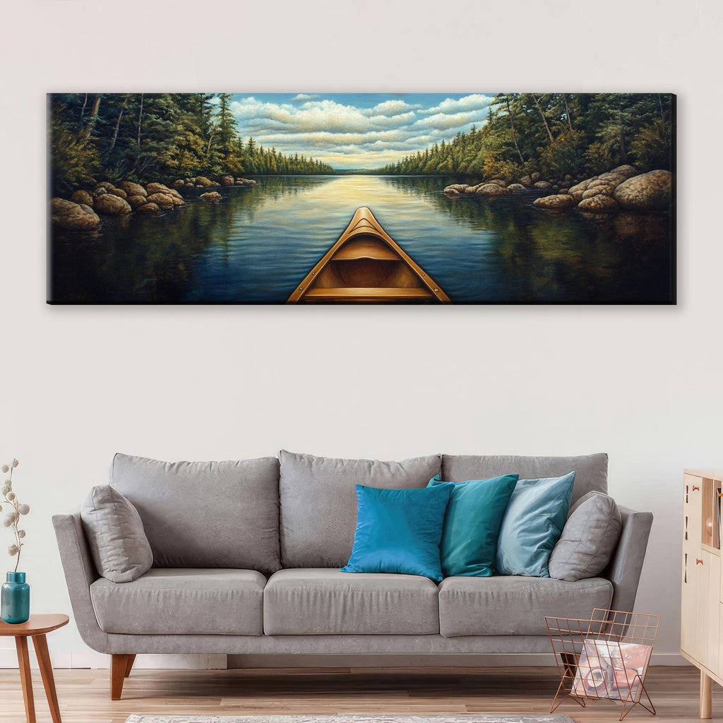 a living room with a couch and a painting on the wall