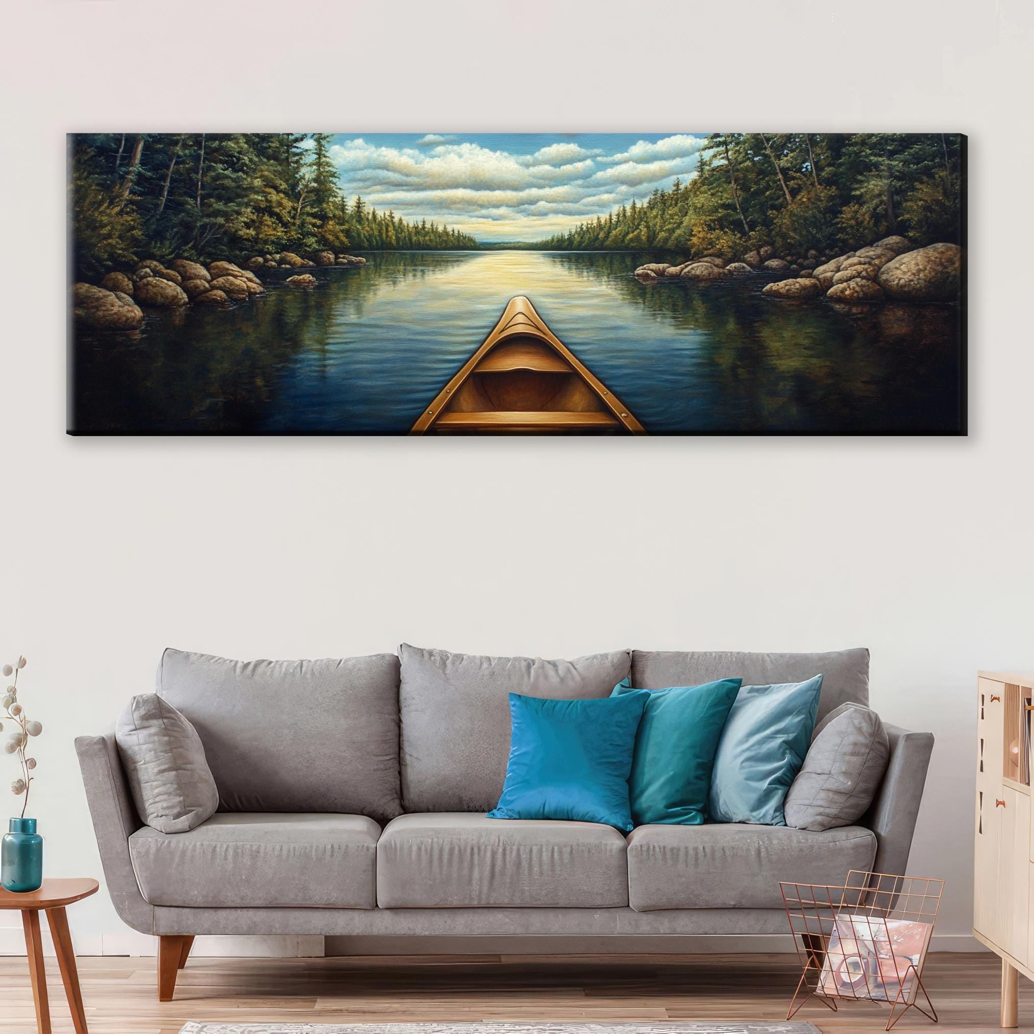 a living room with a couch and a painting on the wall