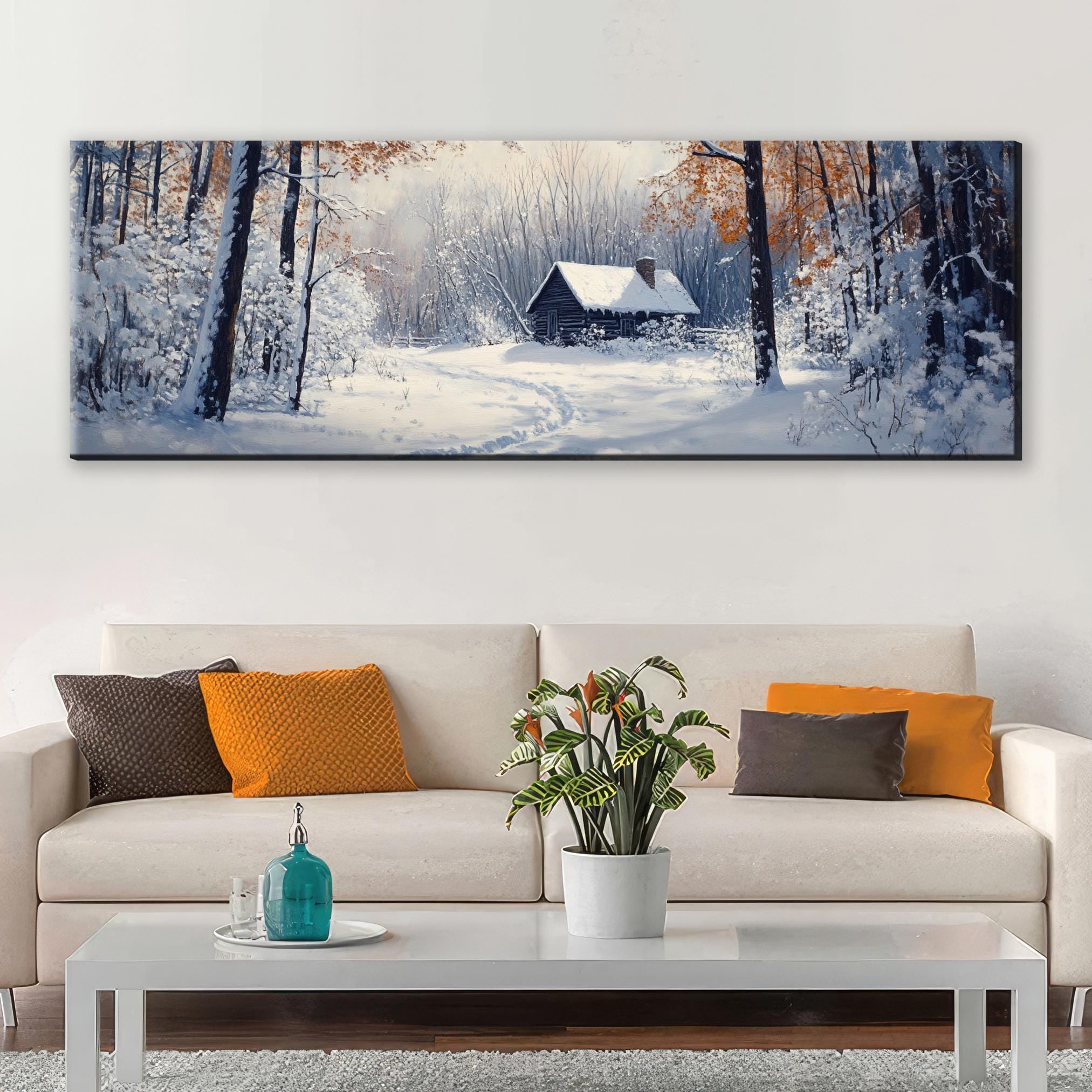 a living room with a couch and a painting on the wall